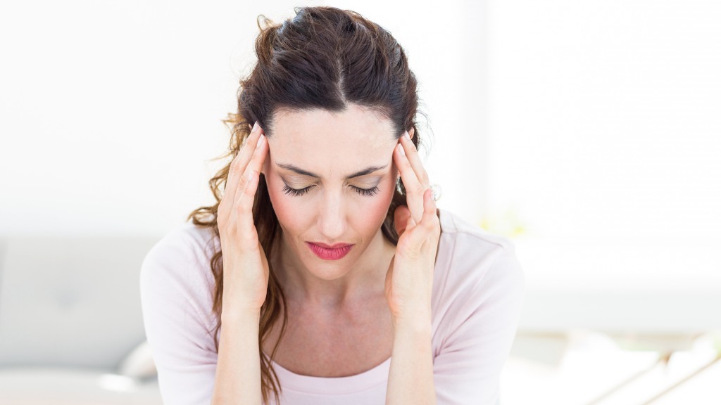 Mujer con dolor de cabeza